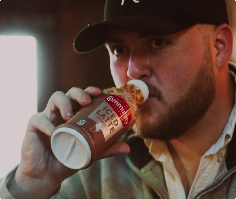 Man drinking Iced Latte